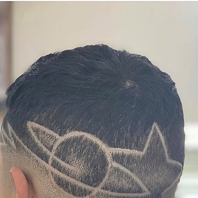 Client's custom star design cut at Styled by Sanky Barbershop